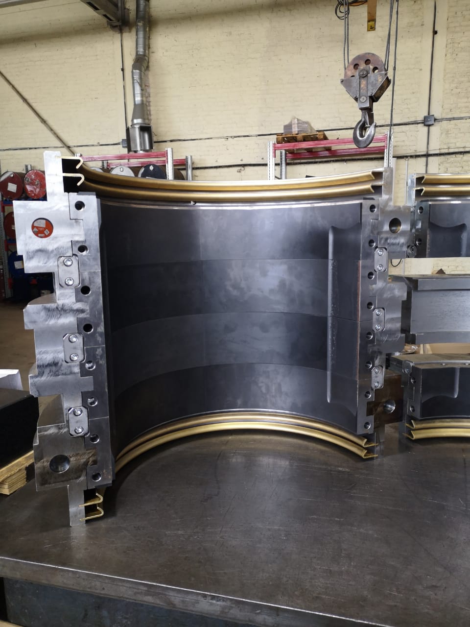Other — large segmented bearing shell on bench